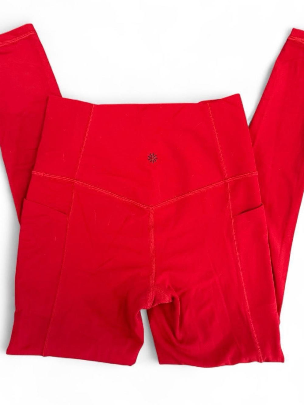 athleta salutation stash tight in red